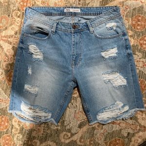 ZARA cut off shorts. Distressed. Rips. Size 32.